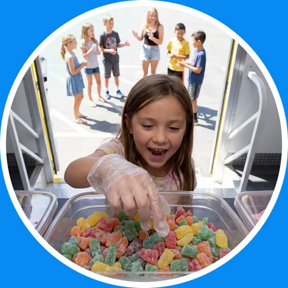 Little girl picking candy